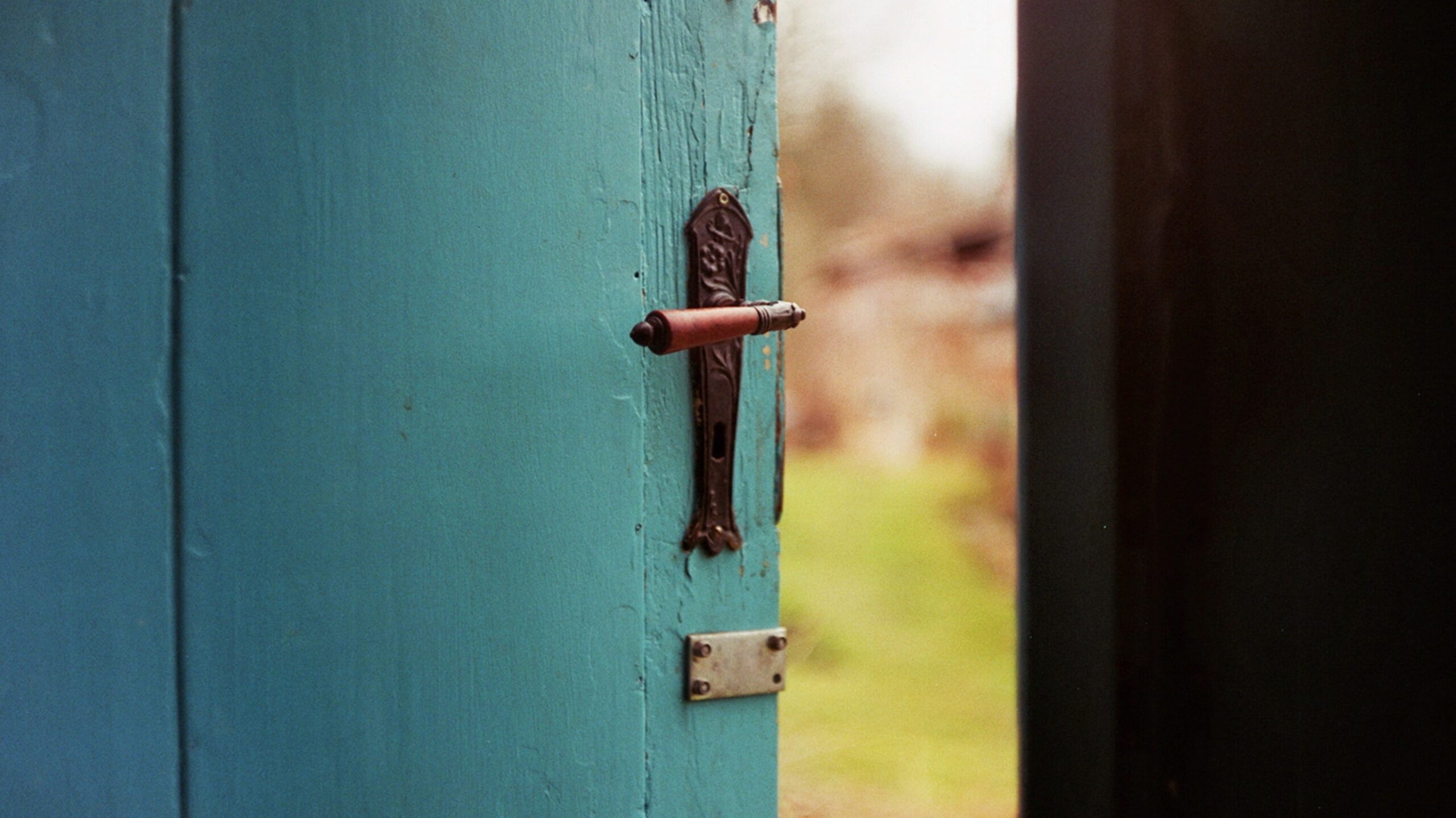 blue door slightly open