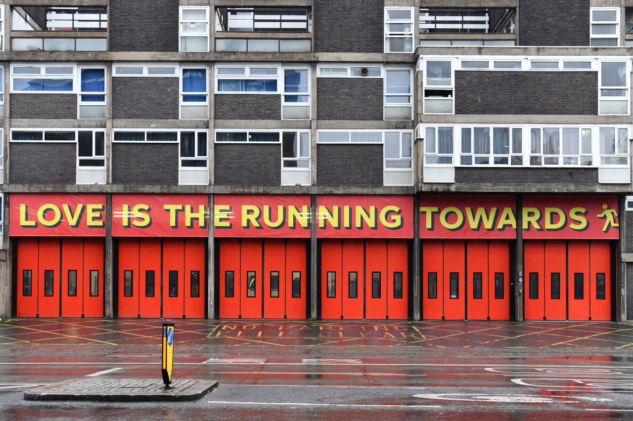 love running towards A sign reading, "Love is the Running Towards" found at Shoreditch Fire Station